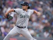 Seattle Mariners starting pitcher Marco Gonzales works against the Colorado Rockies during the first inning of a baseball game Tuesday, July 20, 2021, in Denver.