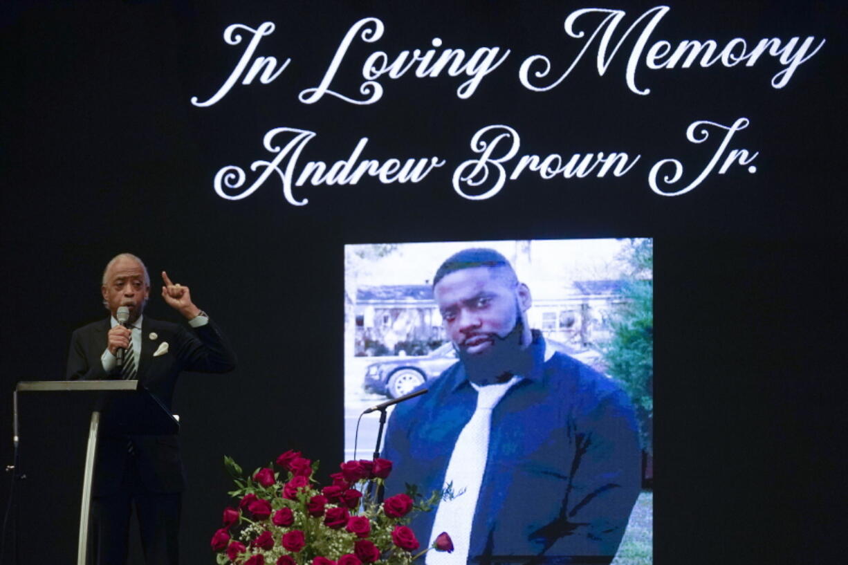 FILE - In this May 3, 2021, file photo Rev. Al Sharpton speaks during the funeral for Andrew Brown Jr., at Fountain of Life Church in Elizabeth City, N.C.  The family of Brown, an unarmed Black man who was fatally shot by sheriff's deputies in North Carolina, filed a $30 million civil rights lawsuit on Wednesday July 14.  Brown was killed April 21 by Pasquotank County Sheriff's deputies while they were serving drug-related warrants at his Elizabeth City home.