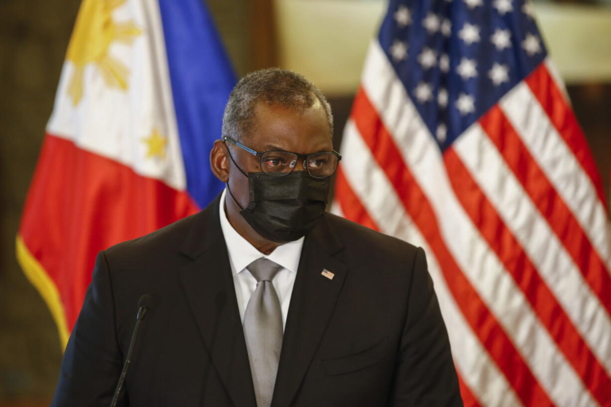 United States Defense Secretary Lloyd Austin holds a press conference with Philippines Defense Secretary Delfin Lorenzana (not in photo) after a bilateral meeting at Camp Aguinaldo military camp in Quezon City, Metro Manila, Philippines Friday, July 30, 2021. Austin is visiting Manila to hold talks with Philippine officials to boost defense ties and possibly discuss the The Visiting Forces Agreement between the US and Philippines.