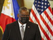 United States Defense Secretary Lloyd Austin holds a press conference with Philippines Defense Secretary Delfin Lorenzana (not in photo) after a bilateral meeting at Camp Aguinaldo military camp in Quezon City, Metro Manila, Philippines Friday, July 30, 2021. Austin is visiting Manila to hold talks with Philippine officials to boost defense ties and possibly discuss the The Visiting Forces Agreement between the US and Philippines.