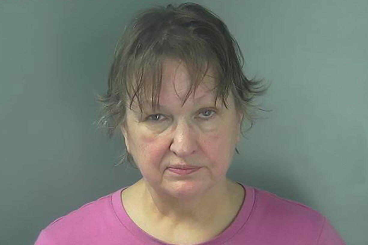 FILE - This July 9, 2020 file photo provided by the Monroe County Correctional Center in Bloomington, Ind., shows Christi Bennett. The case against Bennett, an Indiana woman who was charged in a hit-and-run crash during a southern Indiana protest last summer was dropped after prosecutors confirmed she died in Colorado earlier this year. Christi Jane Bennett, was found dead in a Denver hotel room on Feb. 6, 2021, according to police.