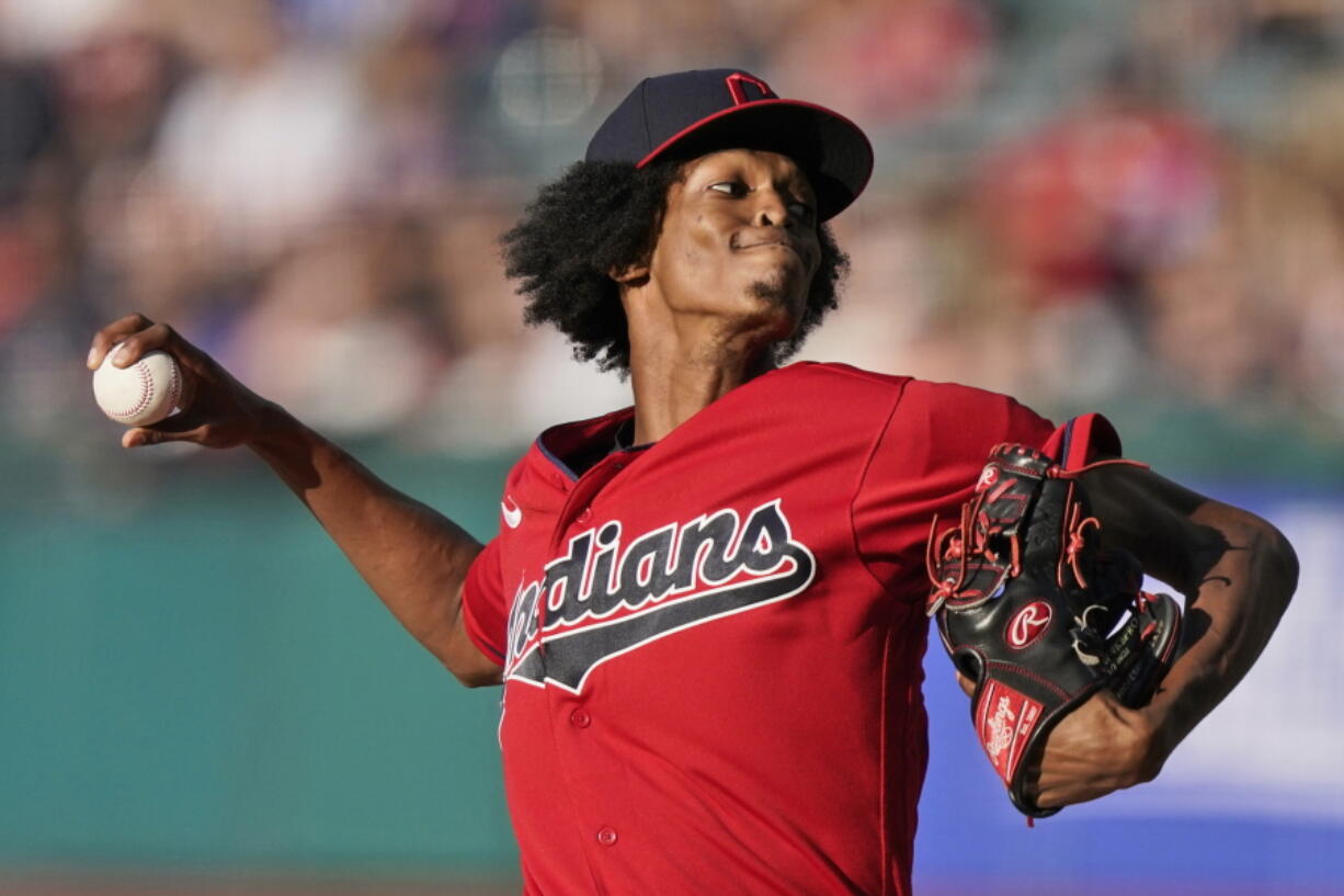 Cleveland Indians starting pitcher Triston McKenzie delivers in the first inning of a baseball game against the Kansas City Royals, Friday, July 9, 2021, in Cleveland.