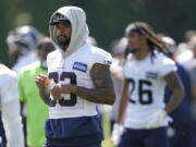 Seattle Seahawks strong safety Jamal Adams walks off the field after NFL football practice Wednesday, July 28, 2021, in Renton, Wash. (AP Photo/Ted S.