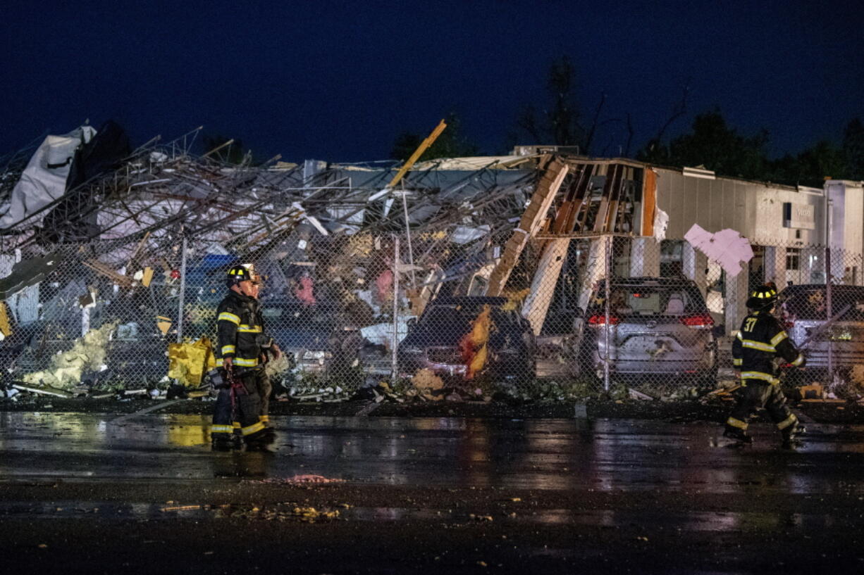 The scene at Faulkner Auto Group service center after a tornado hit in Trevose, Pa. Thursday, July 29, 2021. Five people were injured Thursday when a building at a Bensalem auto dealership was destroyed by severe weather, authorities said.