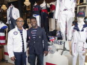 Olympic medalists in fencing, Peter Westbrook, left, and Daryl Homer model the Team USA Tokyo Olympic opening ceremony uniforms at the Ralph Lauren SoHo store on Wednesday, July 7, 2021, in New York.