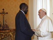 FILE - In this March 16, 2019 file photo, South Sudan President Salva Kiir Mayardit meets Pope Francis during their private audience at the Vatican. Pope Francis and the Archbishop of Canterbury marked the 10th anniversary of the independence of South Sudan on Friday, July 9, 2021, by urging its rival political leaders to make the necessary personal sacrifices to consolidate peace.