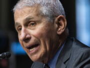 FILE - In this May 11, 2021 file photo, Dr. Anthony Fauci, director of the National Institute of Allergy and Infectious Diseases, speaks during a Senate Health, Education, Labor, and Pensions hearing to examine an update from Federal officials on efforts to combat COVID-19, on Capitol Hill in Washington. Fauci said Sunday, July 11 "it is entirely conceivable, maybe likely" that Americans will need a third booster dose of the COVID-19 vaccine in the coming months, but it was too soon for the government to recommend that now. Fauci, who is President Joe Biden's chief medical adviser, said the Centers for Disease Control and Prevention and the Food and Drug Administration did the right thing last week by pushing back against drugmaker Pfizer's assertion about a booster within 12 months.