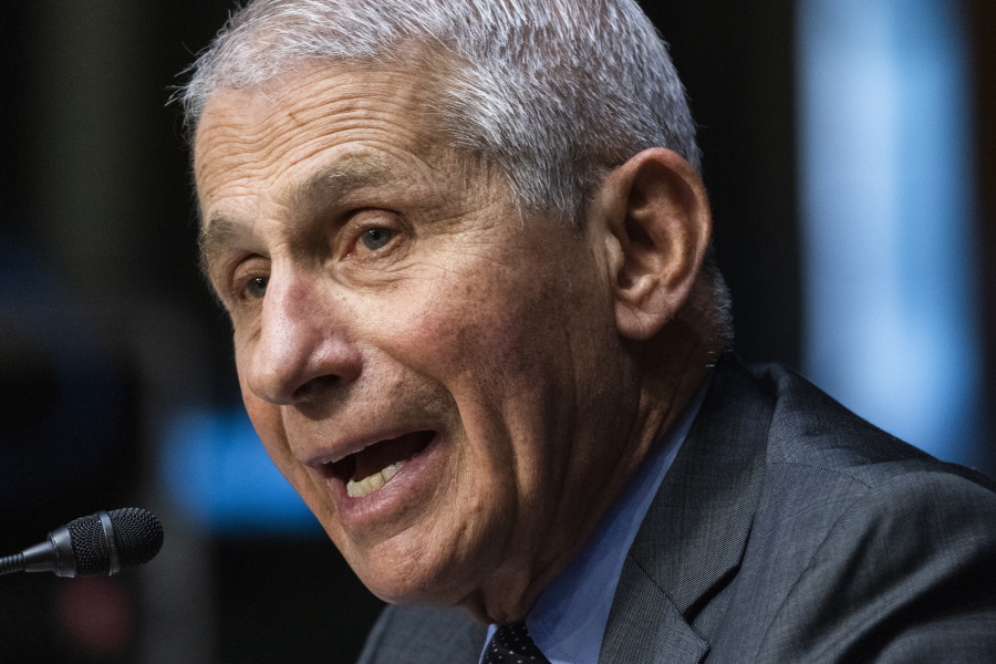 FILE - In this May 11, 2021 file photo, Dr. Anthony Fauci, director of the National Institute of Allergy and Infectious Diseases, speaks during a Senate Health, Education, Labor, and Pensions hearing to examine an update from Federal officials on efforts to combat COVID-19, on Capitol Hill in Washington. Fauci said Sunday, July 11 "it is entirely conceivable, maybe likely" that Americans will need a third booster dose of the COVID-19 vaccine in the coming months, but it was too soon for the government to recommend that now. Fauci, who is President Joe Biden's chief medical adviser, said the Centers for Disease Control and Prevention and the Food and Drug Administration did the right thing last week by pushing back against drugmaker Pfizer's assertion about a booster within 12 months.