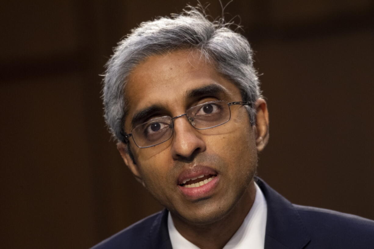 FILE - In this Feb. 25, 2021 file photo, Vivek Murthy testifies before the Senate Health, Education, Labor, and Pensions committee on Capitol Hill in Washington. The nation's top doctor says it's "certainly possible" that Americans eventually will be advised to get a booster shot of the coronavirus vaccine. Surgeon General Murthy told CNN that no decision had been made yet after a meeting Monday, July 12 with Pfizer to discuss its request for approval of a third shot of its coronavirus vaccine.