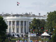 Preparations take place for an Independence Day celebration on the South Lawn of the White House, Saturday, July 3, 2021, in Washington.