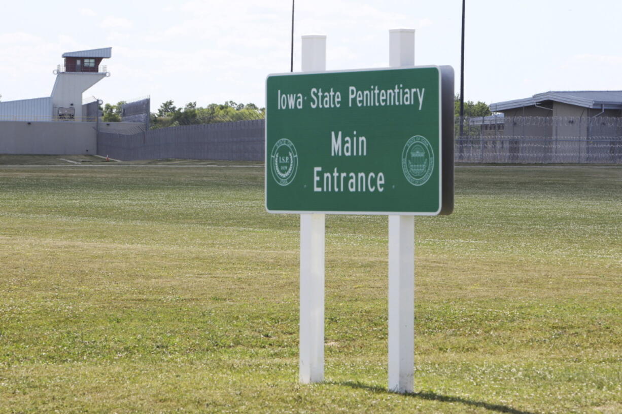 FILE - This July 1, 2017 file photo, shows the Iowa State Penitentiary in Fort Madison, Iowa. One of two Iowa prison nurses fired for accidentally giving dozens of inmates large overdoses of the coronavirus vaccine is appealing her termination, arguing she is "blameless" for the mix-up. The Iowa Department of Corrections fired Amanda Dodson, a registered nurse at the maximum-security Iowa State Penitentiary in Fort Madison, after an investigation found dozens of inmates received shots containing up to six times the recommended dose of the Pfizer vaccine.