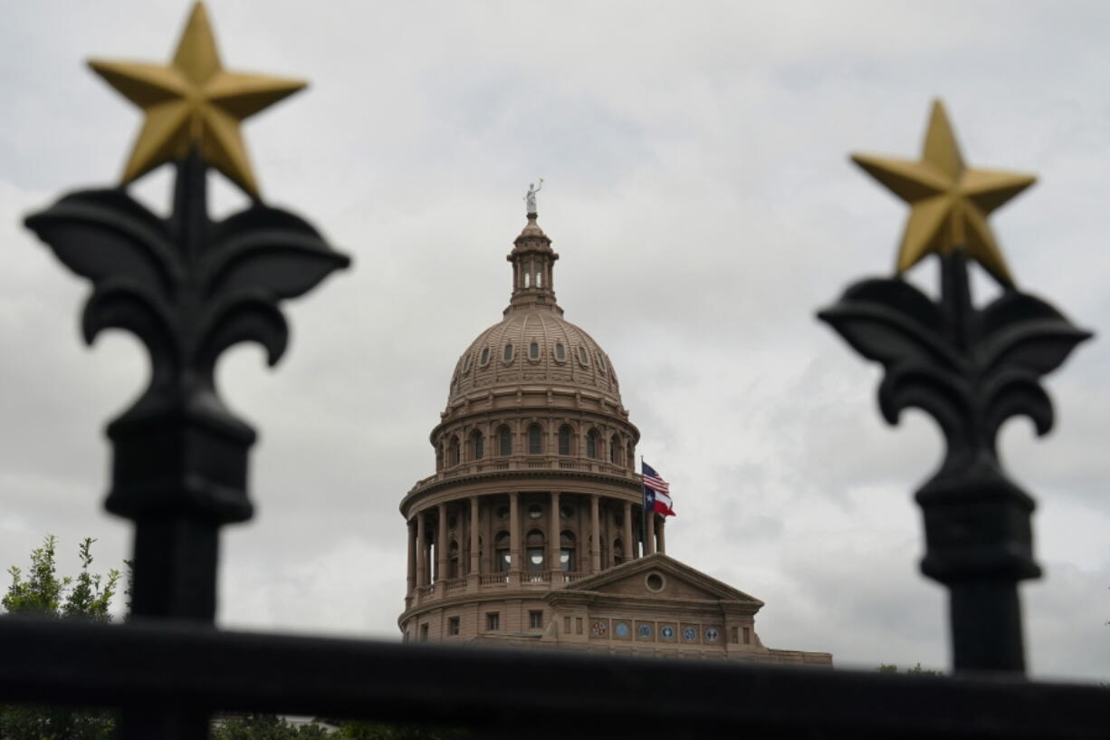 FILE - This June 1, 2021, file photo shows the State Capitol in Austin, Texas. Democrats in the Texas Legislature are planning to leave the state in another revolt against a GOP overhaul of election laws. A person with knowledge of the decision told The Associated Press that Democrats are set to once again break quorum at the Texas Legislature in a dramatic showdown over voting rights in America.