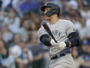 New York Yankees starting pitcher Jameson Taillon throws to a Seattle Mariners batter during the seventh inning of a baseball game Tuesday, July 6, 2021, in Seattle. (AP Photo/Ted S.