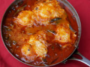 Eggs Poached in a Chile-Tomato Broth, a recipe with peppers. (Hillary Levin/St.