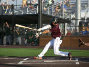 Ridgefield's Brady Kasper takes a swing in a West Coast League baseball game at Ridgefield Outdoor Recreation Complex on Wednesday, August 4, 2021.