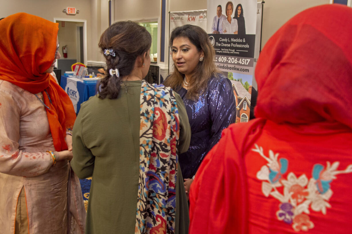 Muqaddas Ejaz speaks with her guests at a gathering of American Muslims in South Jersey on July 7 that celebrated her election to the Camden County Democratic Committee.