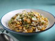 Corn and edamame succotash salad, toped with quest fresco, prepared and style by Shannon Kinsella.