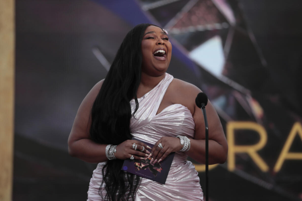 Lizzo presents Best New Artist on stage at the 63rd Grammy Awards outside Staples Center in Los Angeles on Sunday, March 14, 2021.