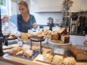 Jessica Gipe arranges pasteries at the Bleu Door Bakery in Vancouver in 2015.