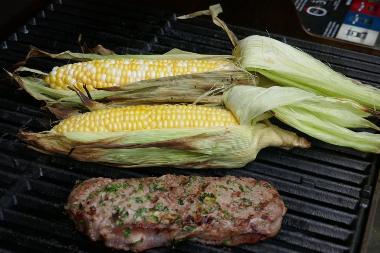 Stuffed Steak and Grilled Corn on the Cob (Linda Gassenheimer/TNS)