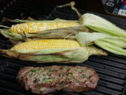 Stuffed Steak and Grilled Corn on the Cob (Linda Gassenheimer/TNS)