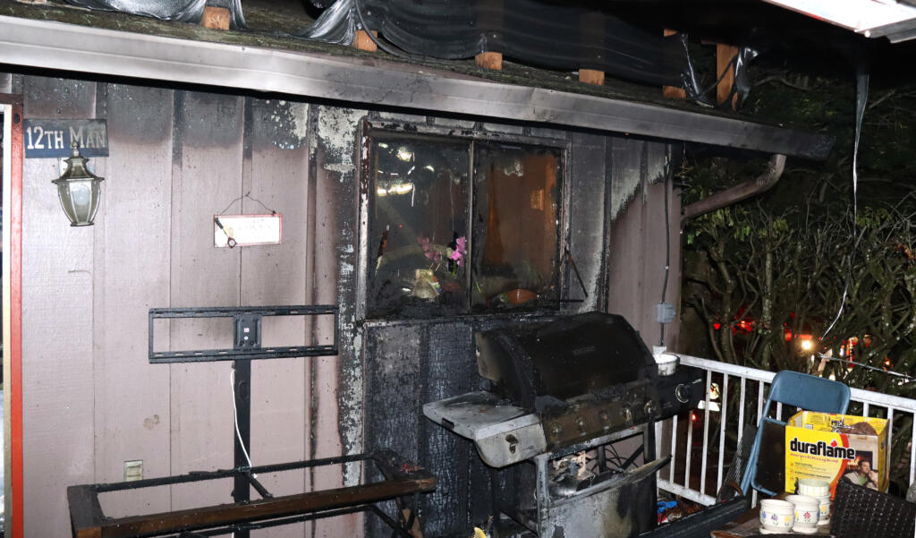 A propane grill fire destroyed a house in the Cascade Park area Monday night and displaced four residents.