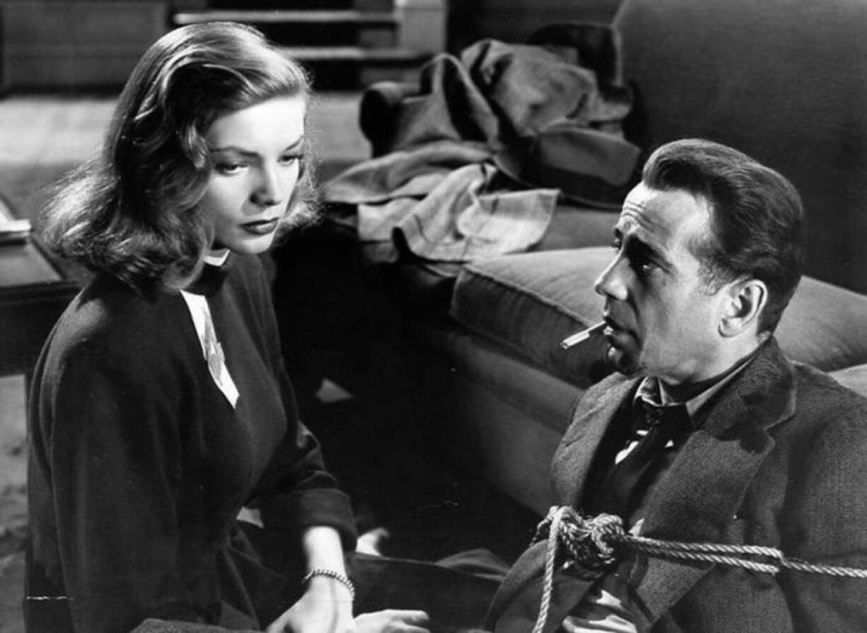 There's never been snappier dialog -- and more onscreen electricity -- than between Humphrey Bogart and Lauren Bacall in 1946's "The Big Sleep." (Warner Brothers Pictures)