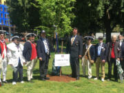 ESTHER SHORT: From left are Sons of the American Revolution members Larry Heckethorne; George Vernon; Larry Peck; Andrew Brewer; Paul Ocker; Carl Gray; Keith Weissinger, president; Alfred Folkerts; Greg Lucas, vice president; and Jeff Lightburn, president of the Fort Vancouver Chapter, at a tree planting earlier this year.