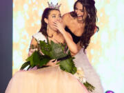 Payton May, right, crowns Marcelle LeBlanc of Alabama as Miss America?s Outstanding Teen 2022.