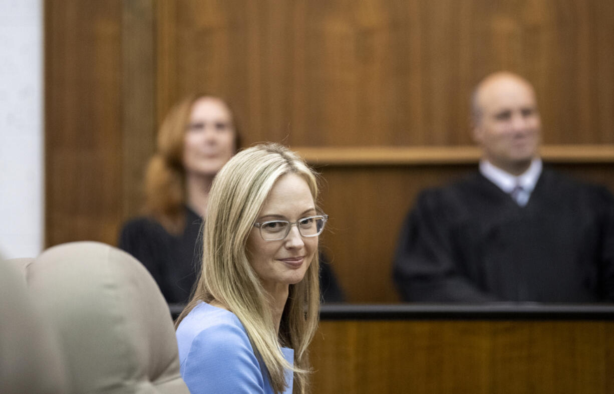 District Court Judge Abigail Bartlett waits to be sworn in at the Clark County Courthouse on Thursday afternoon. She began her career in Clark County at the prosecutor's office before becoming a District Court commissioner in 2017.