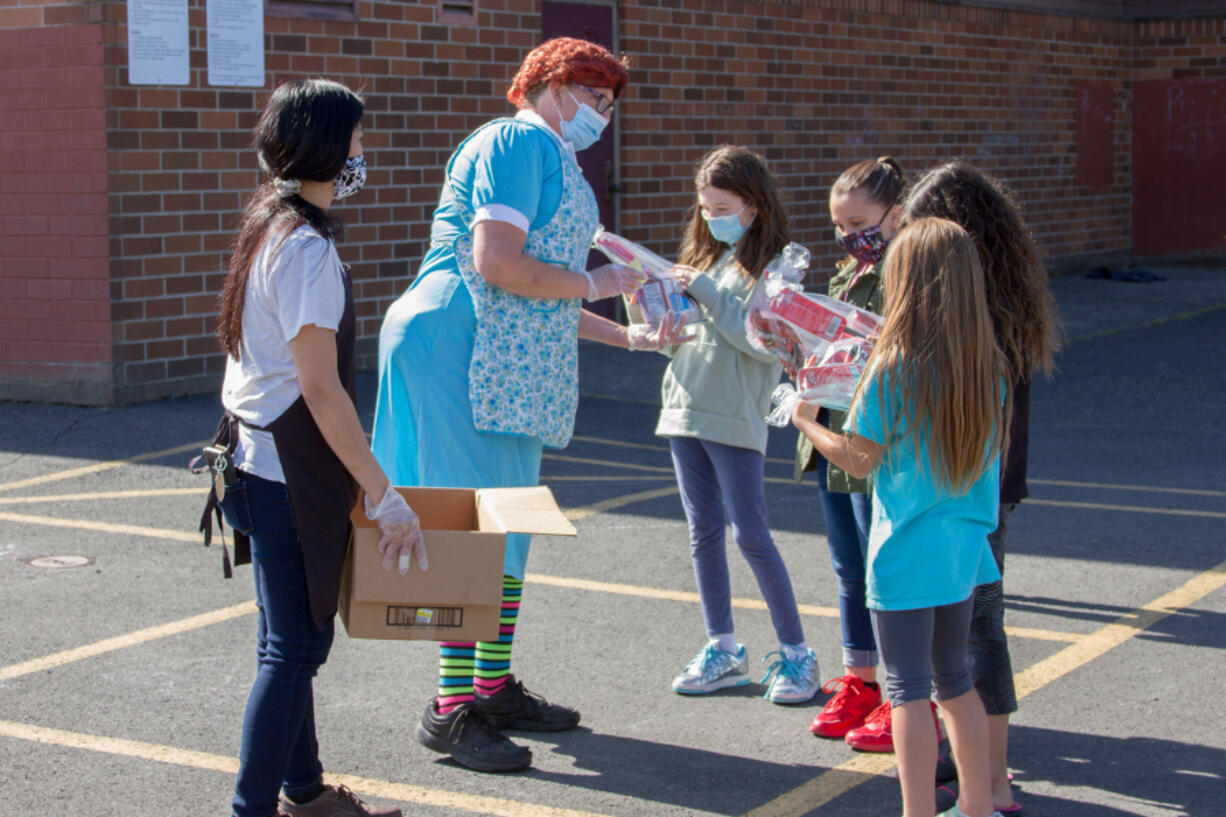 WOODLAND: Anna Moran and Cristina Forgey delivered prizes directly to all of the contest participants.