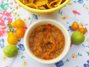 The main ingredients in this salsa -- tomatillos and cherry tomatoes, plus cherry and bell peppers -- make this an approachably sweet and mellow condiment.