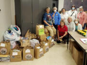 Boxes and bags of school supplies were taken to the Battle Ground Education Foundation office on the district's Lewisville campus by Greater Federation of Women's Club-Battle Ground members. Standing are: Ginger Crabtree, president Mary Lee Miller, Nancy Lee, Johanna Hyatt and Linda Tochen. In front are Marla Polos, Paulette Stinson and Valerie Huey. Not pictured was Cindi Pike, member photographer.