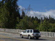 Power transmission lines and towers that run east through Vancouver are pictured above Burnt Bridge Creek on Monday morning. A balloon hit one of the lines near this spot on Aug. 21 and caused a brief power outage for nearly 19,000 people.