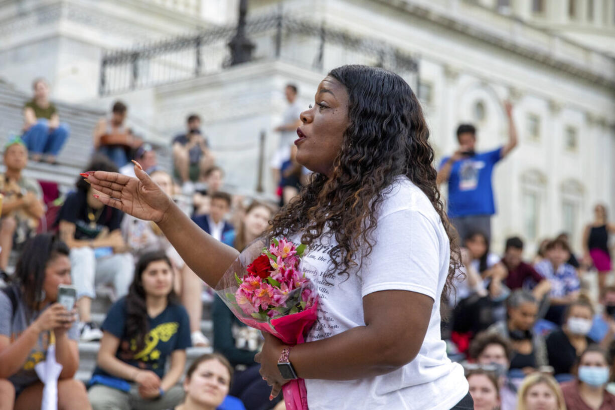 Rep. Cori Bush, D-Mo., speaks to crowds that attended a sit-in at Capitol Hill after it was announced that the Biden administration will enact a targeted nationwide eviction moratorium outside of Capitol Hill in Washington on Tuesday, August 3, 2021. For the past five days, lawmakers and activists primarily led by Rep. Cori Bush, D-Mo., have been sitting in on the steps of Capitol Hill to protest the expiration of the eviction moratorium.