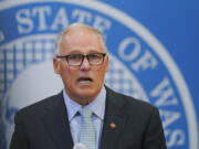 Washington Gov. Jay Inslee speaks at a news conference, Wednesday, Aug. 18, 2021, at the Capitol in Olympia, Wash.  (AP Photo/Ted S.