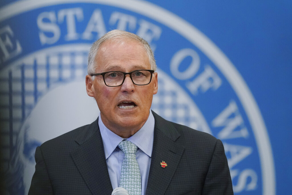 Washington Gov. Jay Inslee speaks at a news conference, Wednesday, Aug. 18, 2021, at the Capitol in Olympia, Wash.  (AP Photo/Ted S.