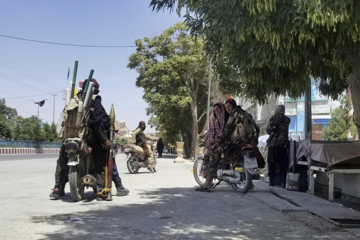 Taliban fighters patrol inside the city of Ghazni, southwest of Kabul, Afghanistan, Thursday, Aug. 12, 2021. The Taliban captured the provincial capital near Kabul on Thursday, the 10th the insurgents have taken over a weeklong blitz across Afghanistan as the U.S. and NATO prepare to withdraw entirely from the country after decades of war.