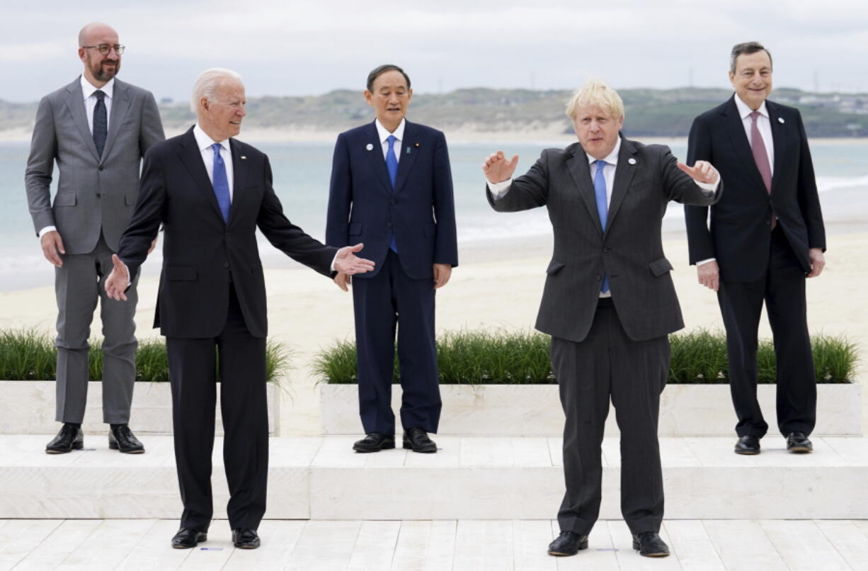 FILE - In this Friday, June 11, 2021 file photo, leaders of the G7 pose during a group photo at the G7 meeting at the Carbis Bay Hotel in Carbis Bay, St. Ives, Cornwall, England. When U.S. President Joe Biden took office early this year, Western allies were falling over themselves to welcome and praise him and hail a new era in trans-Atlantic cooperation. The collapse of Kabul certainly put a stop to that. Even some of his biggest fans are now churning out criticism.