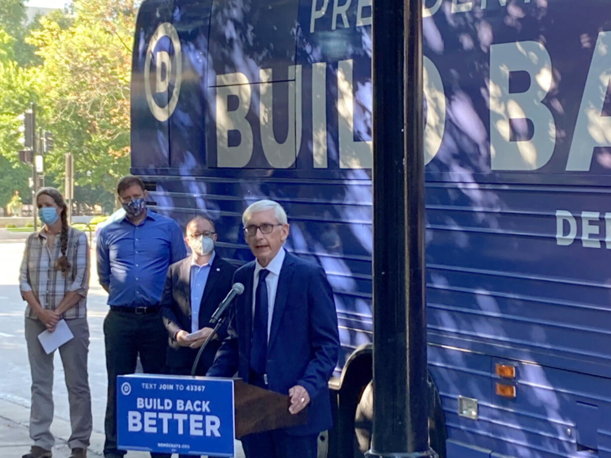 Democratic Gov. Tony Evers said that it was "outrageous" that Republicans planned to spend $680,000 on an investigation into the 2020 election in Wisconsin on Monday, Aug. 30, 2021, during a Democratic Party bus tour that stopped outside the state Capitol in Madison, Wisc.