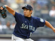 Seattle Mariners starting pitcher Yusei Kikuchi (18) throws against the New York Yankees during the second inning of a baseball game Sunday, Aug. 8, 2021, in New York. (AP Photo/Noah K.