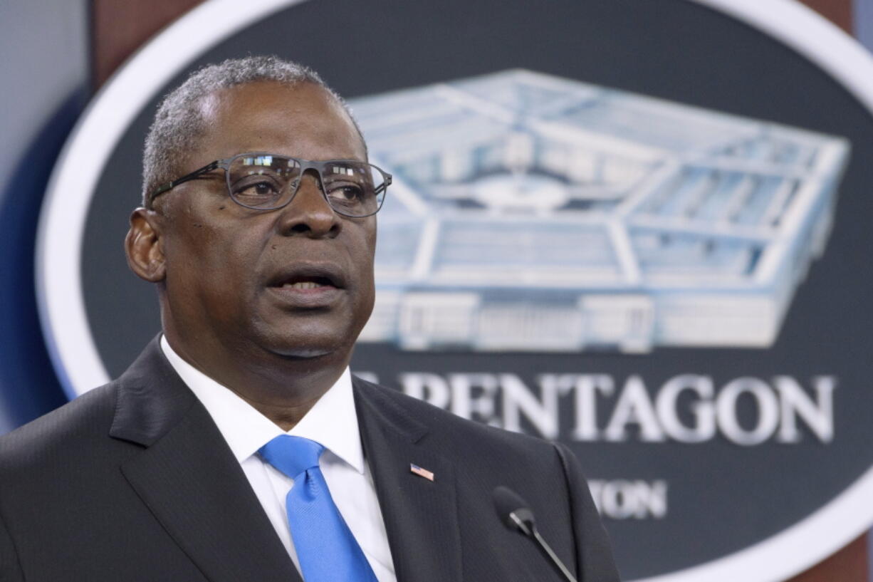 FILE - In this July 21, 2021 file photo, Defense Secretary Lloyd Austin speaks at a press briefing at the Pentagon in Washington. Austin has said he is working expeditiously to make the COVID-19 vaccine mandatory for military personnel and is expected to ask Biden to waive a federal law that requires individuals be given a choice if the vaccine is not fully licensed.