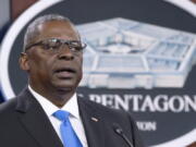 FILE - In this July 21, 2021 file photo, Defense Secretary Lloyd Austin speaks at a press briefing at the Pentagon in Washington. Austin has said he is working expeditiously to make the COVID-19 vaccine mandatory for military personnel and is expected to ask Biden to waive a federal law that requires individuals be given a choice if the vaccine is not fully licensed.