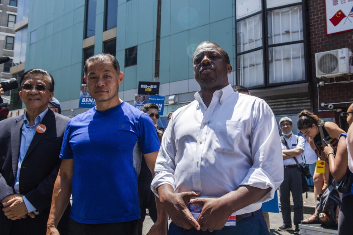 FILE - New York State Senator Brian Benjamin, right, and State Senator John Liu, second from left, attend the "Voting is Justice Rally," on June 20, 2021, in New York. Gov. Kathy Hochul has chosen Benjamin, a Democrat from Harlem, to be her lieutenant governor.