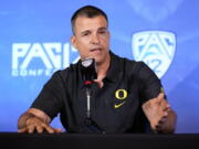 Oregon head coach Mario Cristobal answers questions during the Pac-12 Conference NCAA college football Media Day Tuesday, July 27, 2021, in Los Angeles.