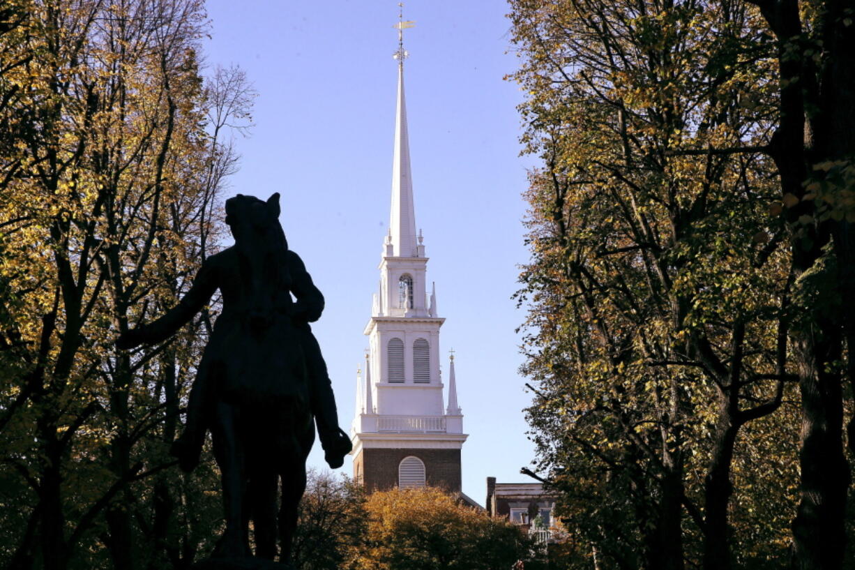 The Old North Church stands behind a statue of Paul Revere in the North End neighborhood of Boston.