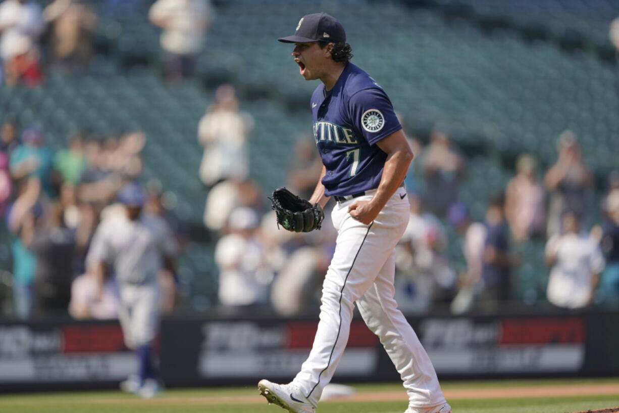 Seattle Mariners starting pitcher Marco Gonzales reacts after the final out the team's baseball game against the Texas Rangers, Thursday, Aug. 12, 2021, in Seattle. Gonzales pitched a two-hitter as the Mariners won 3-1. (AP Photo/Ted S.