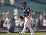 Seattle Mariners starting pitcher Marco Gonzales reacts after the final out the team's baseball game against the Texas Rangers, Thursday, Aug. 12, 2021, in Seattle. Gonzales pitched a two-hitter as the Mariners won 3-1. (AP Photo/Ted S.