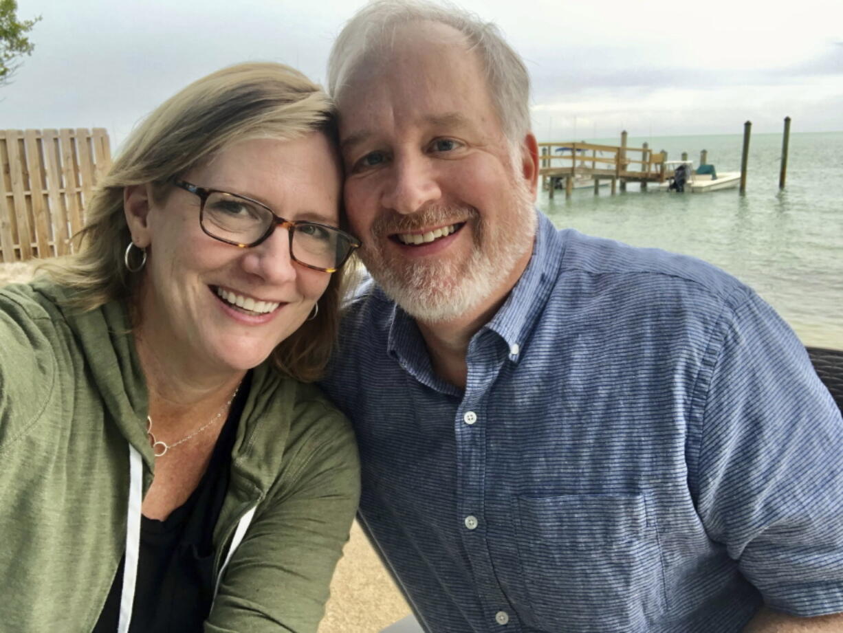 Meg Calkins and her husband Steve Badger appear in the Florida Keys on Feb. 6, 2021. Calkins and Badger rekindled their relationship years after dating in college.