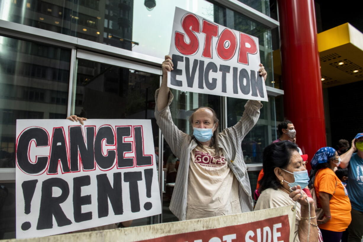 FILE - In this Aug. 4, 2021, file photo, housing advocates protest on the eviction moratorium in New York. The Supreme Court is allowing evictions to resume across the United States, blocking the Biden administration from enforcing a temporary ban that was put in place because of the coronavirus pandemic. Roughly 3.5 million people in the United States said they faced eviction in the next two months, according to Census Bureau data from early August.